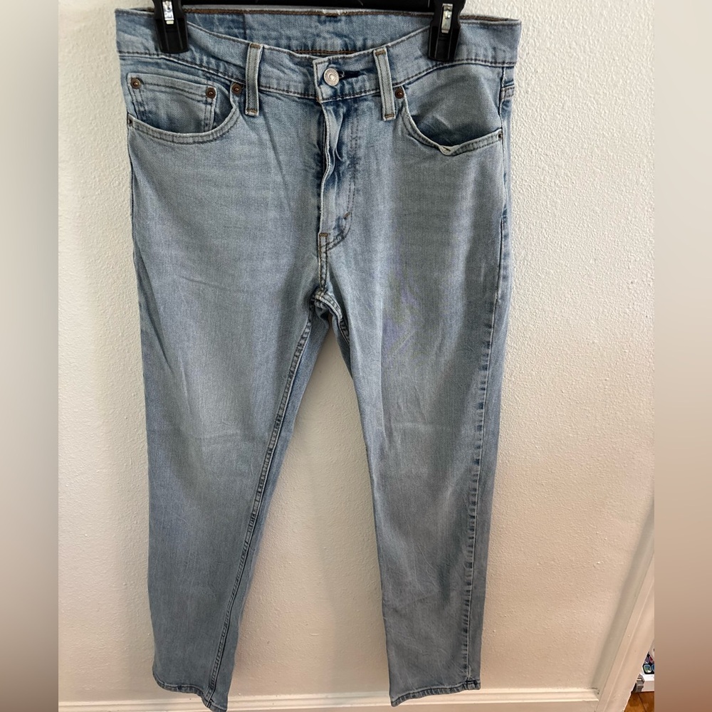 Levi’s 511 light wash jeans with no holes